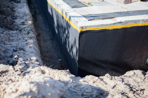 Professional Basement Waterproofing technician working in Spiceland, IN